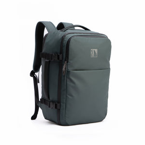 INUK NAVI 38L travel backpack in Black Forest Green, three-quarter front view on white